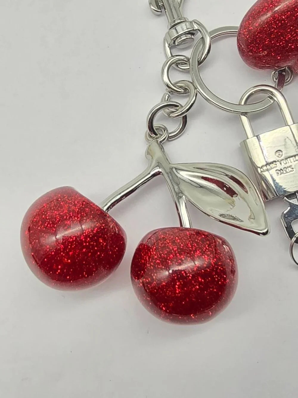 Authentic Louis Vuitton Silver Padlock with Unbranded Red Cherry Charm